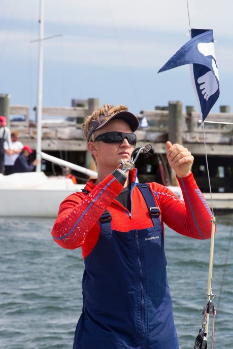 Clagett sailor using electrical tape at the 2015 Clagett Regatta