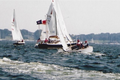 A coach boat, Sonars and the Race Committee boat on the water at the first Clagett Regatta in 2003